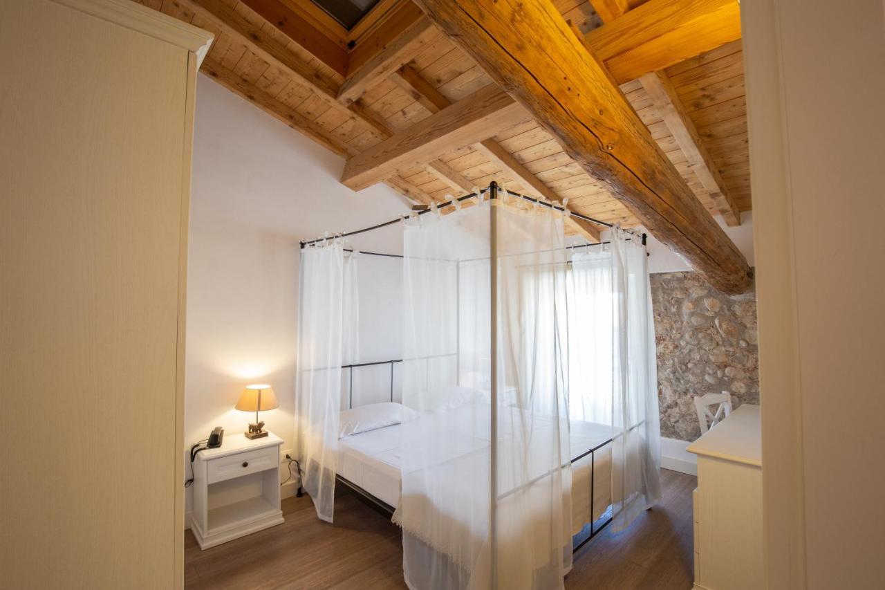 Corte San Carlo Aparthotel Colà